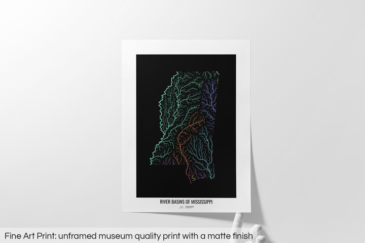 Unframed fine art print of a colourful map with a thick white mat. The title of the map and the Grasshopper Geography logo is printed on the mat, below the image. The map print lies flat on a white surface, a hand holding up one of the corners. The bottom text reads: Fine art print - unframed museum quality print with a matte finish.