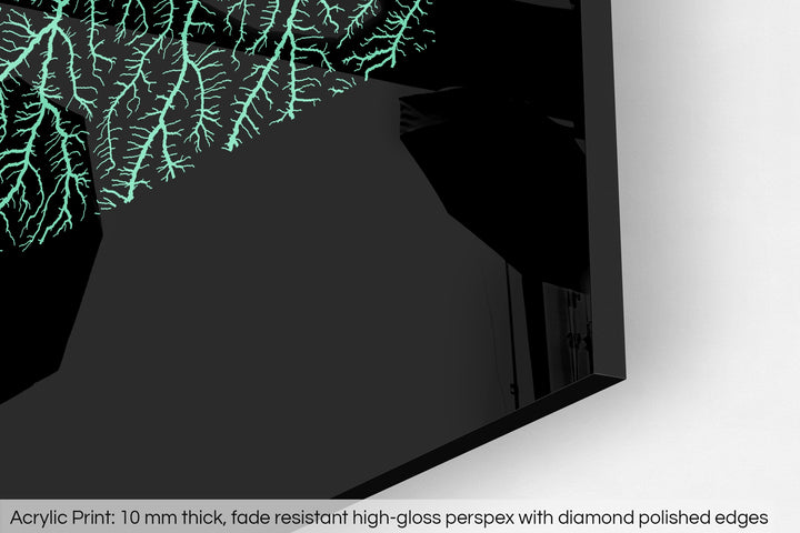 Closeup of an acrylic panel's corner, the details of a Grasshopper Geography map is visible. The text at the bottom reads: Acrylic print - 10 mm thick, fade reistant high-gloss perspex with diamond polished edges.