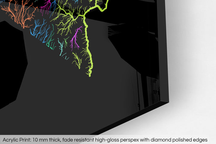 Closeup of an acrylic panel's corner, the details of a Grasshopper Geography map is visible. The text at the bottom reads: Acrylic print - 10 mm thick, fade reistant high-gloss perspex with diamond polished edges.