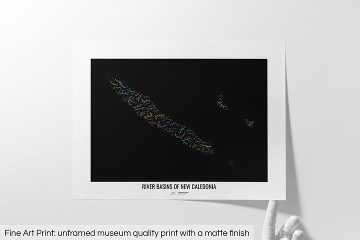 Unframed fine art print of a colourful map with a thick white mat. The title of the map and the Grasshopper Geography logo is printed on the mat, below the image. The map print lies flat on a white surface, a hand holding up one of the corners. The bottom text reads: Fine art print - unframed museum quality print with a matte finish.