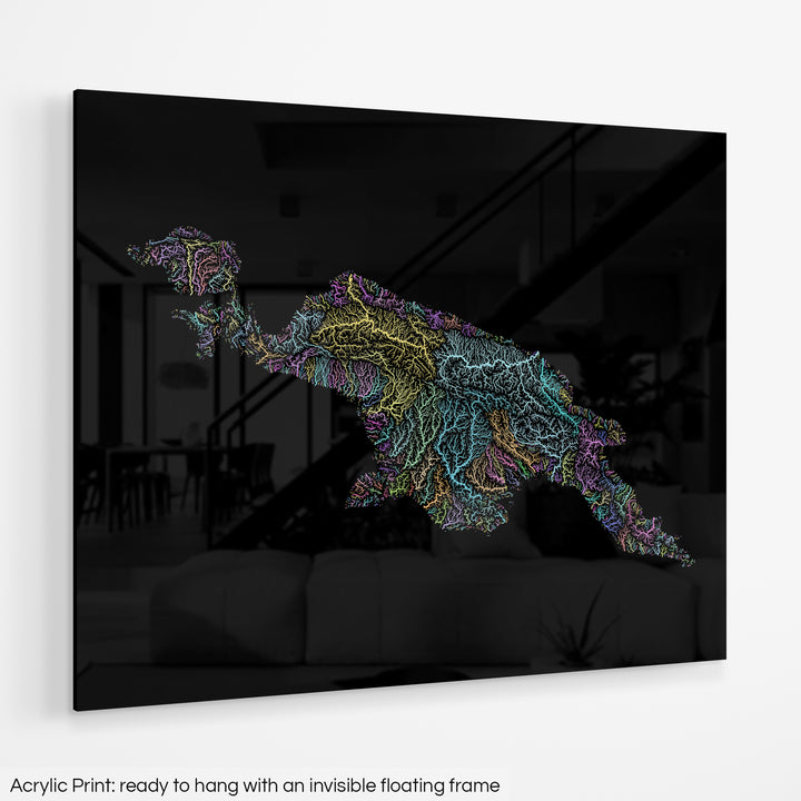 A colourful Grasshopper Geography map hanging on a white wall. The text at the bottom reads: Acrylic print - ready to hang with an invisible floating frame.