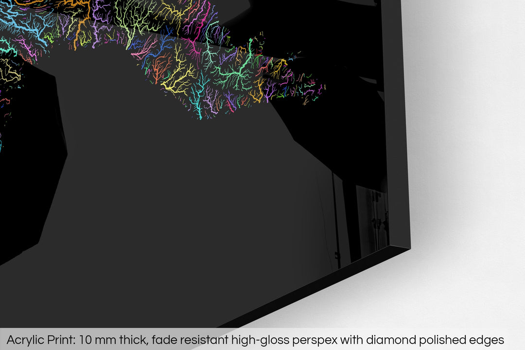 Closeup of an acrylic panel's corner, the details of a Grasshopper Geography map is visible. The text at the bottom reads: Acrylic print - 10 mm thick, fade reistant high-gloss perspex with diamond polished edges.