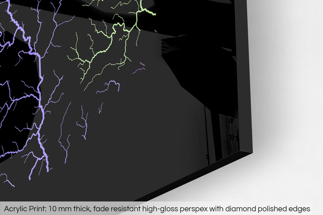 Closeup of an acrylic panel's corner, the details of a Grasshopper Geography map is visible. The text at the bottom reads: Acrylic print - 10 mm thick, fade reistant high-gloss perspex with diamond polished edges.