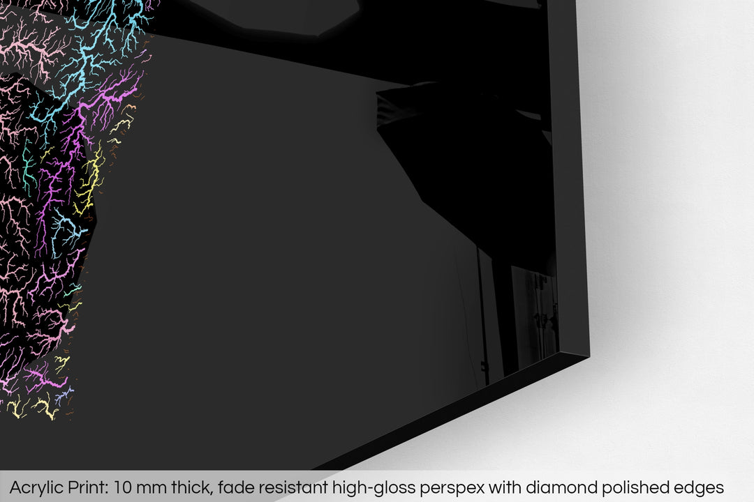 Closeup of an acrylic panel's corner, the details of a Grasshopper Geography map is visible. The text at the bottom reads: Acrylic print - 10 mm thick, fade reistant high-gloss perspex with diamond polished edges.