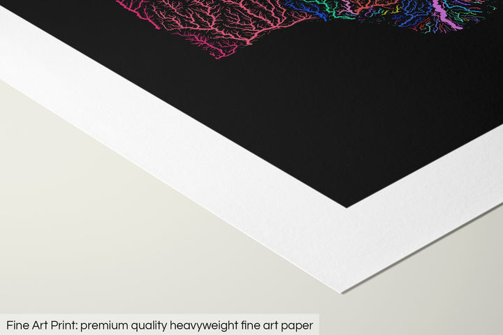 Closeup of a fine art print's corner lying on a flat surface, the details of a Grasshopper Geography map is visible. The text at the bottom reads: Fine art print - premium quality heavyweight fine art paper.