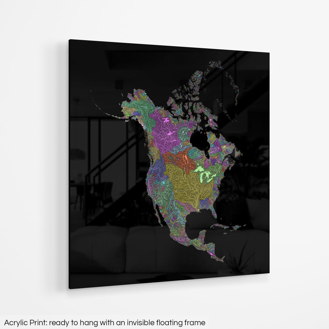 A colourful Grasshopper Geography map hanging on a white wall. The text at the bottom reads: Acrylic print - ready to hang with an invisible floating frame.