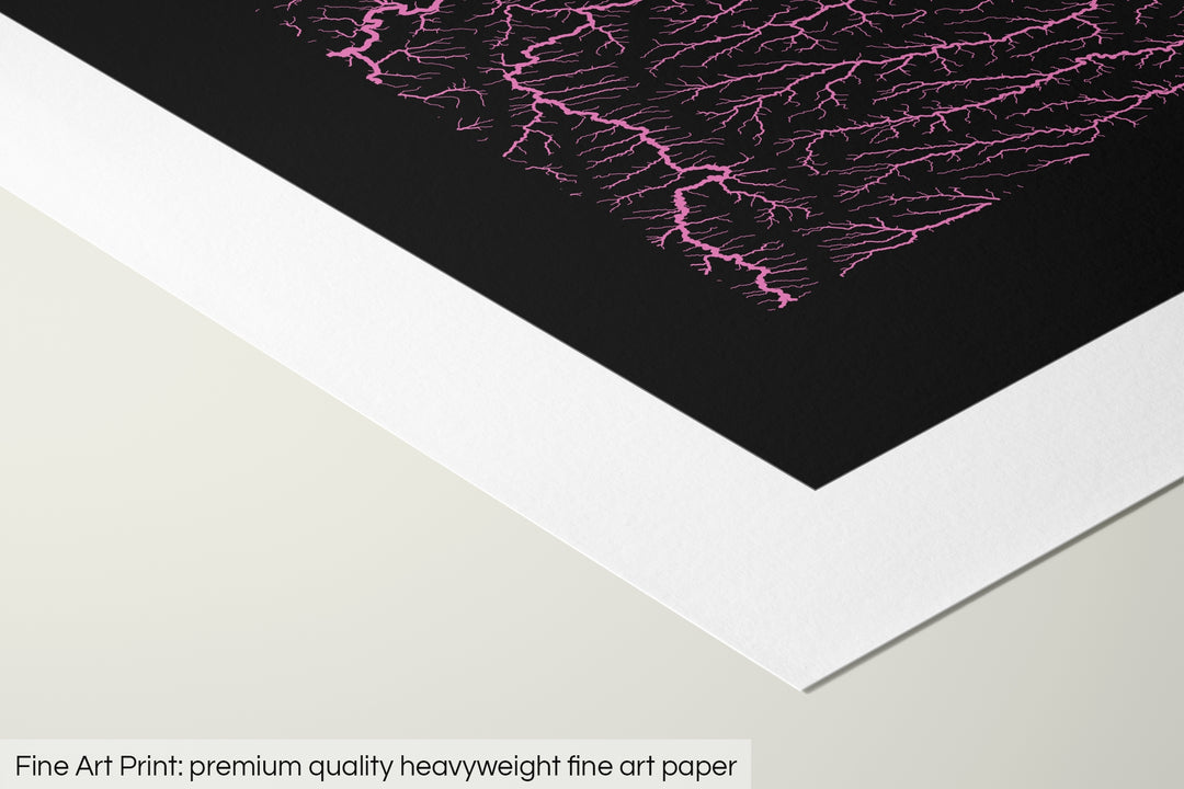 Closeup of a fine art print's corner lying on a flat surface, the details of a Grasshopper Geography map is visible. The text at the bottom reads: Fine art print - premium quality heavyweight fine art paper.
