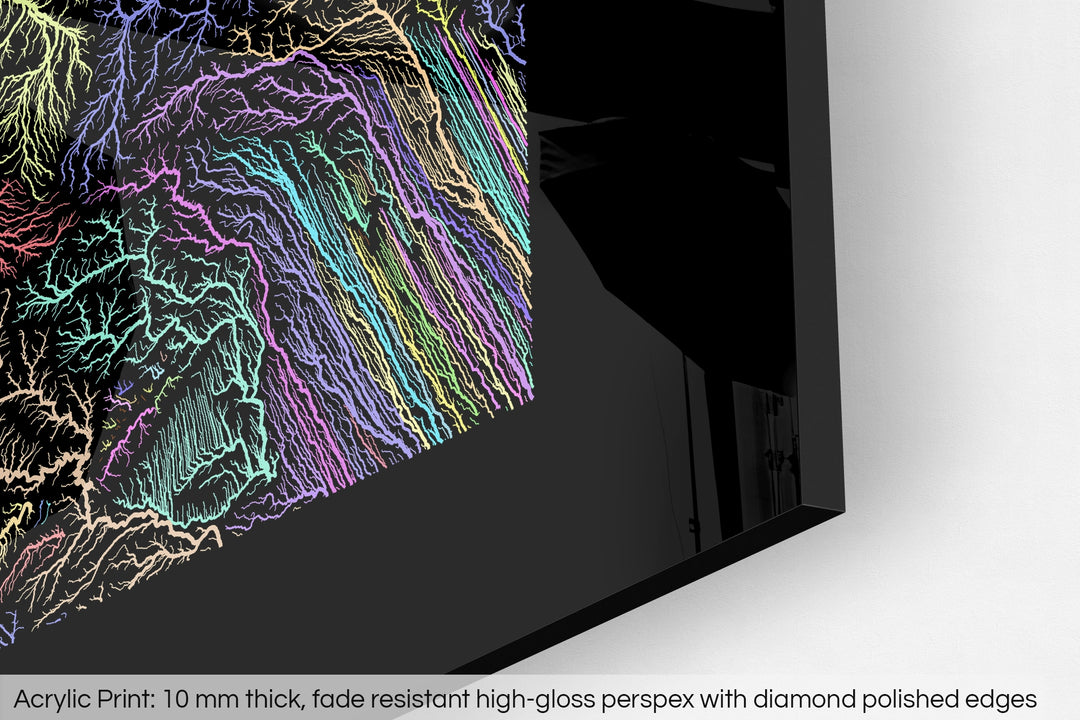 Closeup of an acrylic panel's corner, the details of a Grasshopper Geography map is visible. The text at the bottom reads: Acrylic print - 10 mm thick, fade reistant high-gloss perspex with diamond polished edges.