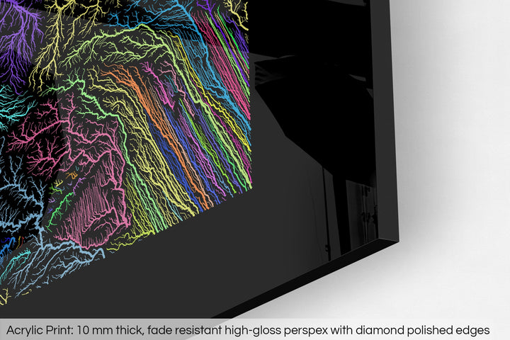 Closeup of an acrylic panel's corner, the details of a Grasshopper Geography map is visible. The text at the bottom reads: Acrylic print - 10 mm thick, fade reistant high-gloss perspex with diamond polished edges.