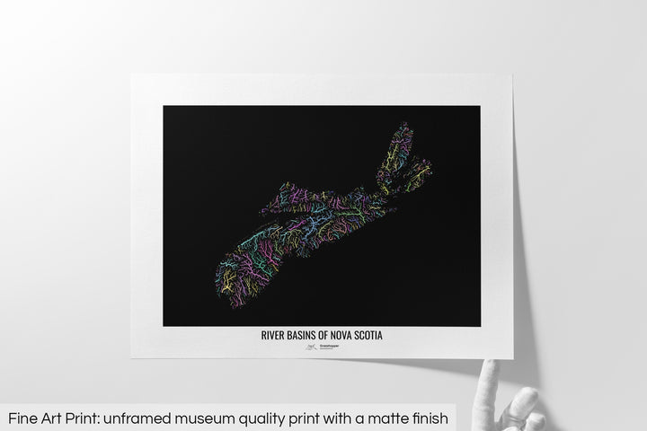 Unframed fine art print of a colourful map with a thick white mat. The title of the map and the Grasshopper Geography logo is printed on the mat, below the image. The map print lies flat on a white surface, a hand holding up one of the corners. The bottom text reads: Fine art print - unframed museum quality print with a matte finish.