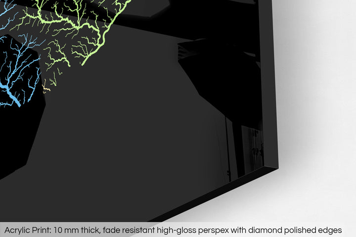 Closeup of an acrylic panel's corner, the details of a Grasshopper Geography map is visible. The text at the bottom reads: Acrylic print - 10 mm thick, fade reistant high-gloss perspex with diamond polished edges.