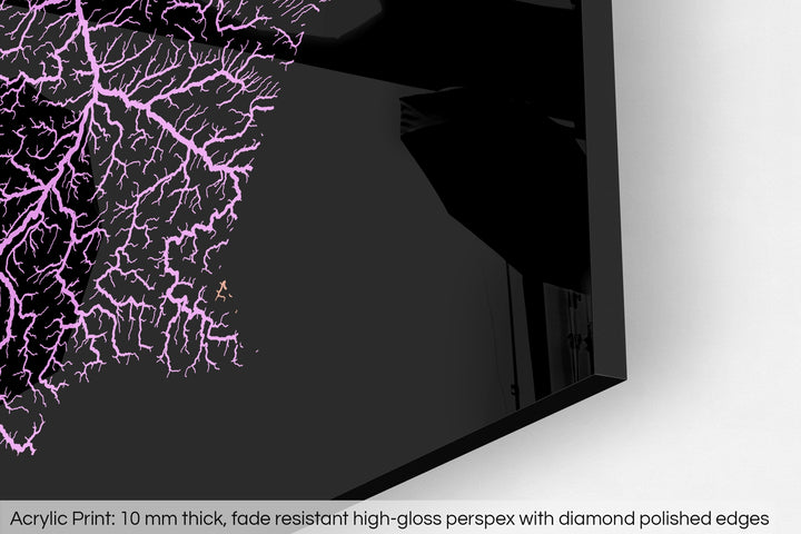 Closeup of an acrylic panel's corner, the details of a Grasshopper Geography map is visible. The text at the bottom reads: Acrylic print - 10 mm thick, fade reistant high-gloss perspex with diamond polished edges.