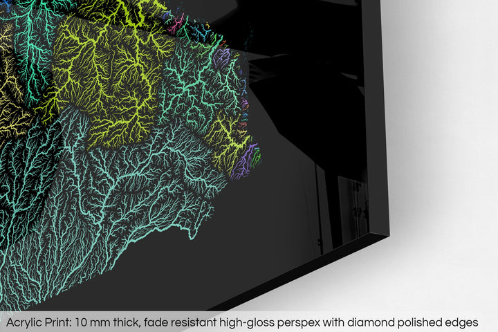 Closeup of an acrylic panel's corner, the details of a Grasshopper Geography map is visible. The text at the bottom reads: Acrylic print - 10 mm thick, fade reistant high-gloss perspex with diamond polished edges.