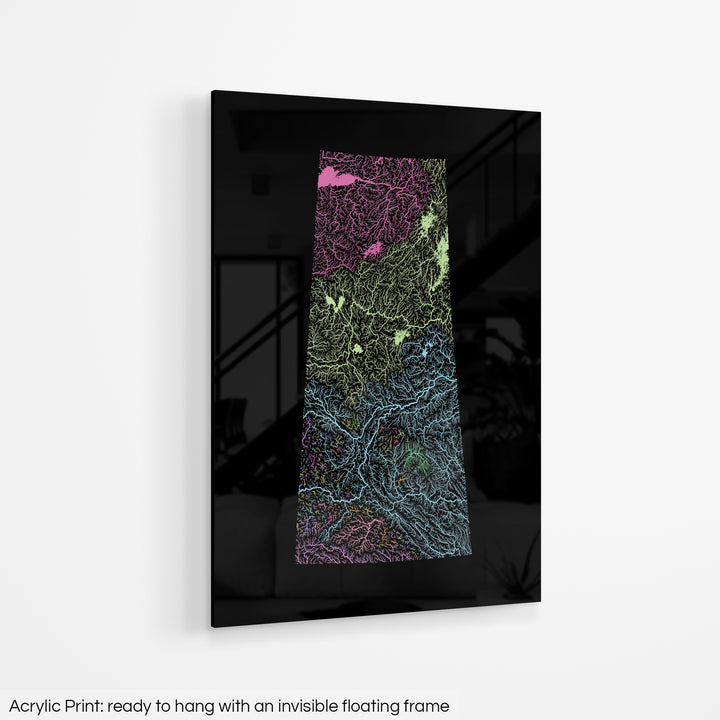 A colourful Grasshopper Geography map hanging on a white wall. The text at the bottom reads: Acrylic print - ready to hang with an invisible floating frame.