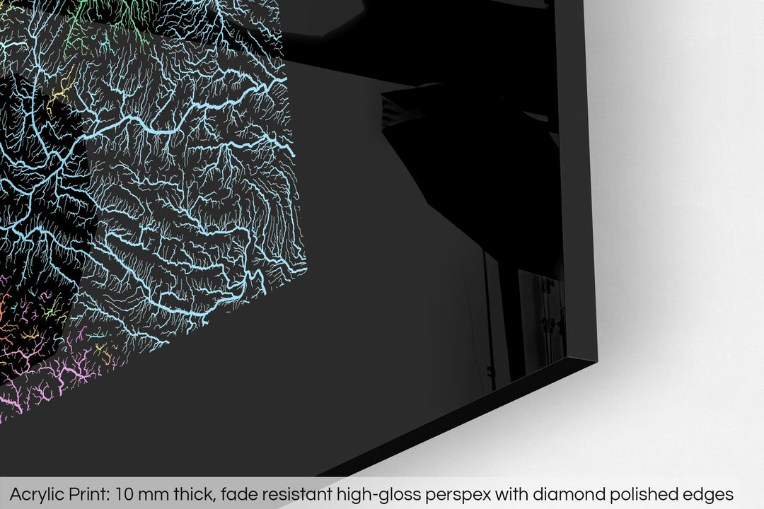 Closeup of an acrylic panel's corner, the details of a Grasshopper Geography map is visible. The text at the bottom reads: Acrylic print - 10 mm thick, fade reistant high-gloss perspex with diamond polished edges.