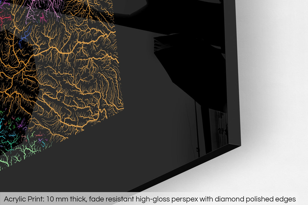 Closeup of an acrylic panel's corner, the details of a Grasshopper Geography map is visible. The text at the bottom reads: Acrylic print - 10 mm thick, fade reistant high-gloss perspex with diamond polished edges.