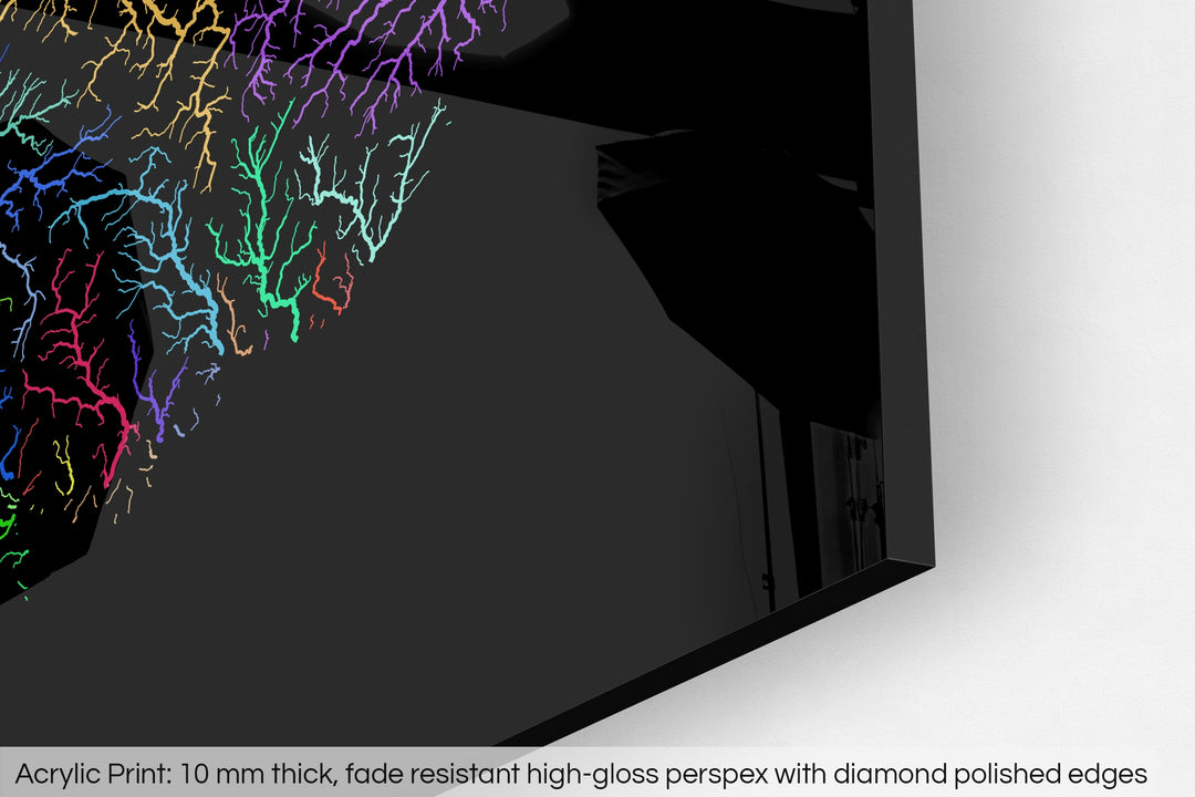 Closeup of an acrylic panel's corner, the details of a Grasshopper Geography map is visible. The text at the bottom reads: Acrylic print - 10 mm thick, fade reistant high-gloss perspex with diamond polished edges.