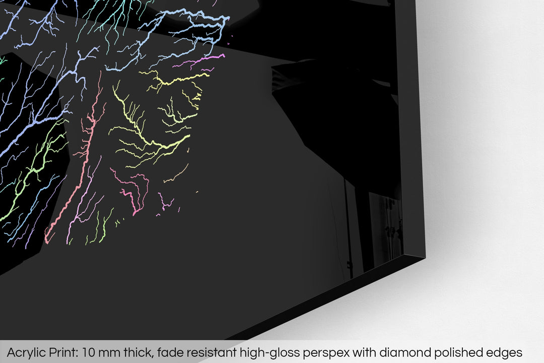 Closeup of an acrylic panel's corner, the details of a Grasshopper Geography map is visible. The text at the bottom reads: Acrylic print - 10 mm thick, fade reistant high-gloss perspex with diamond polished edges.