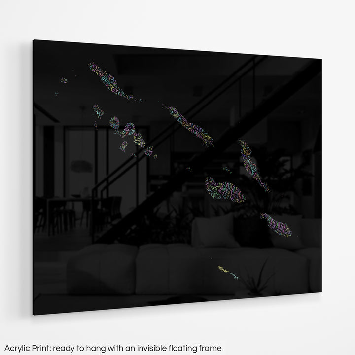 A colourful Grasshopper Geography map hanging on a white wall. The text at the bottom reads: Acrylic print - ready to hang with an invisible floating frame.