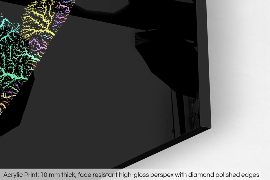 Closeup of an acrylic panel's corner, the details of a Grasshopper Geography map is visible. The text at the bottom reads: Acrylic print - 10 mm thick, fade reistant high-gloss perspex with diamond polished edges.