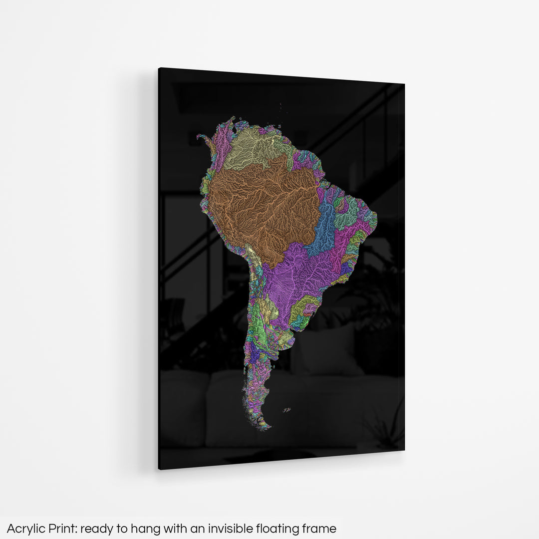 A colourful Grasshopper Geography map hanging on a white wall. The text at the bottom reads: Acrylic print - ready to hang with an invisible floating frame.
