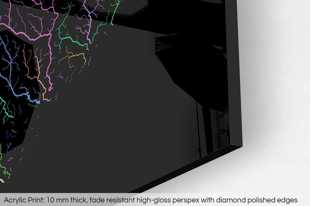 Closeup of an acrylic panel's corner, the details of a Grasshopper Geography map is visible. The text at the bottom reads: Acrylic print - 10 mm thick, fade reistant high-gloss perspex with diamond polished edges.