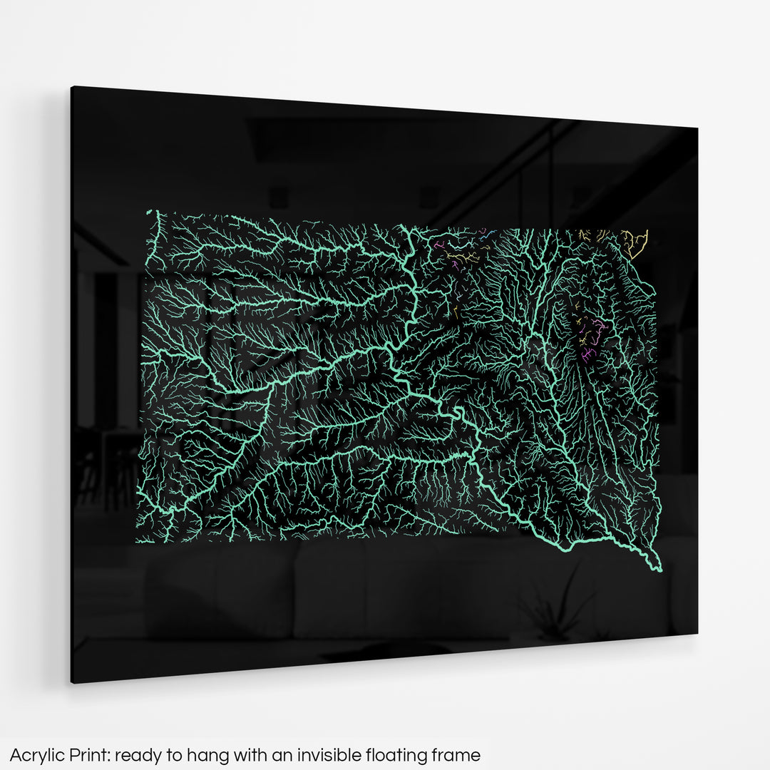 A colourful Grasshopper Geography map hanging on a white wall. The text at the bottom reads: Acrylic print - ready to hang with an invisible floating frame.
