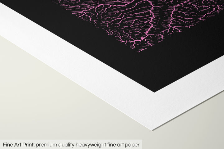 Closeup of a fine art print's corner lying on a flat surface, the details of a Grasshopper Geography map is visible. The text at the bottom reads: Fine art print - premium quality heavyweight fine art paper.