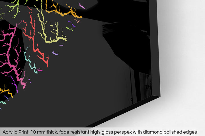 Closeup of an acrylic panel's corner, the details of a Grasshopper Geography map is visible. The text at the bottom reads: Acrylic print - 10 mm thick, fade reistant high-gloss perspex with diamond polished edges.
