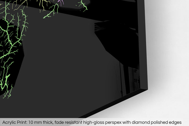 Closeup of an acrylic panel's corner, the details of a Grasshopper Geography map is visible. The text at the bottom reads: Acrylic print - 10 mm thick, fade reistant high-gloss perspex with diamond polished edges.