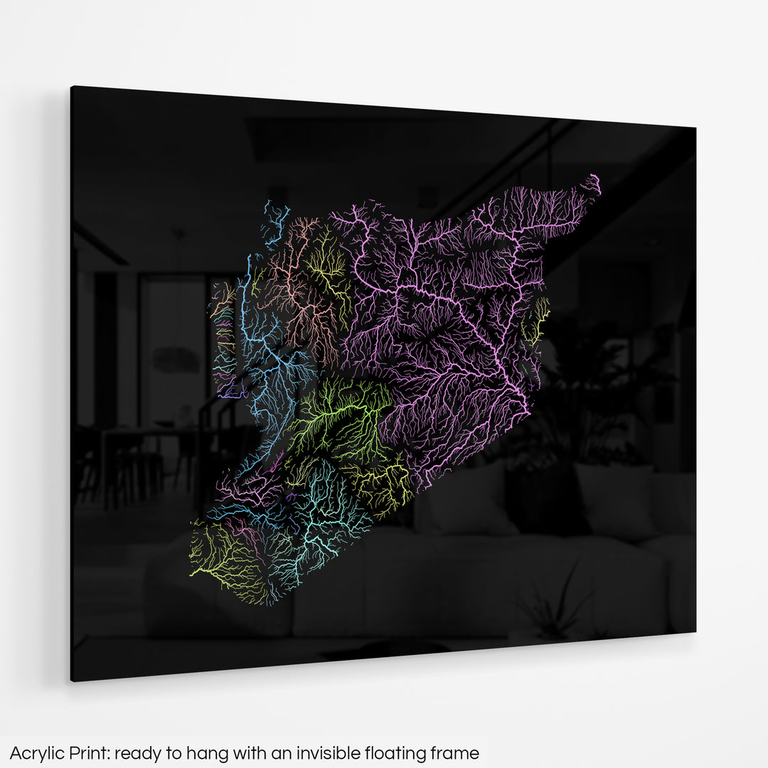 A colourful Grasshopper Geography map hanging on a white wall. The text at the bottom reads: Acrylic print - ready to hang with an invisible floating frame.