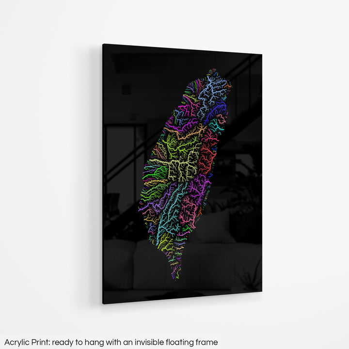 A colourful Grasshopper Geography map hanging on a white wall. The text at the bottom reads: Acrylic print - ready to hang with an invisible floating frame.