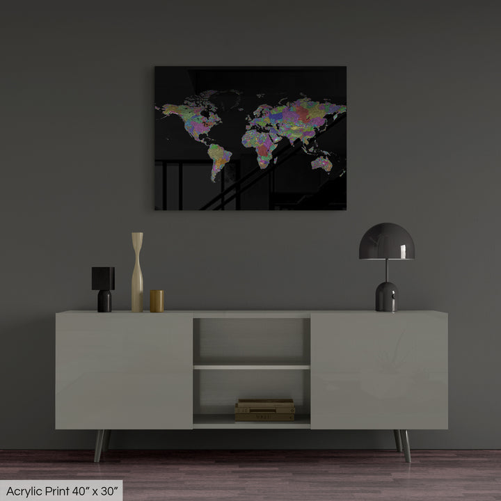 A colourful Grasshopper Geography map, home decor hanging on a grey wall in a living room. The map is printed on an acrylic panel and hangs above a modern low storage cabinet.