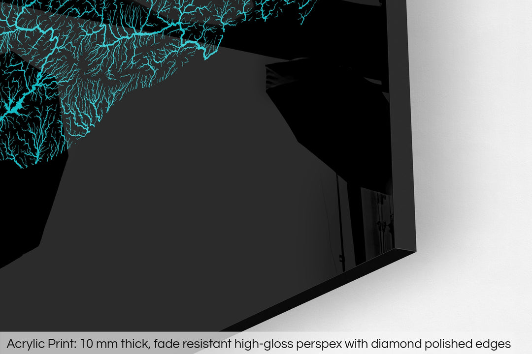 Closeup of an acrylic panel's corner, the details of a Grasshopper Geography map is visible. The text at the bottom reads: Acrylic print - 10 mm thick, fade reistant high-gloss perspex with diamond polished edges.