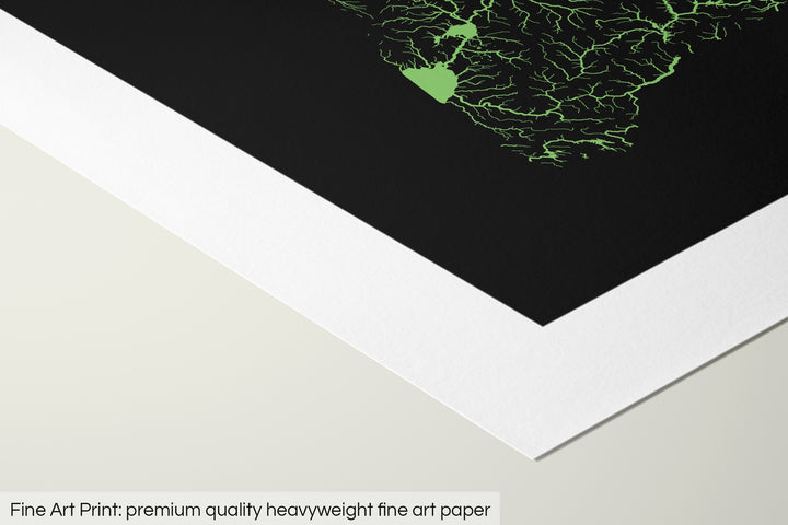 Closeup of a fine art print's corner lying on a flat surface, the details of a Grasshopper Geography map is visible. The text at the bottom reads: Fine art print - premium quality heavyweight fine art paper.