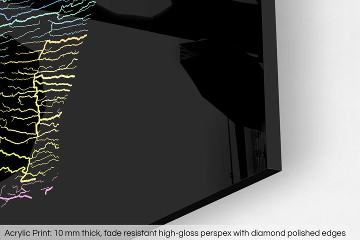 Closeup of an acrylic panel's corner, the details of a Grasshopper Geography map is visible. The text at the bottom reads: Acrylic print - 10 mm thick, fade reistant high-gloss perspex with diamond polished edges.
