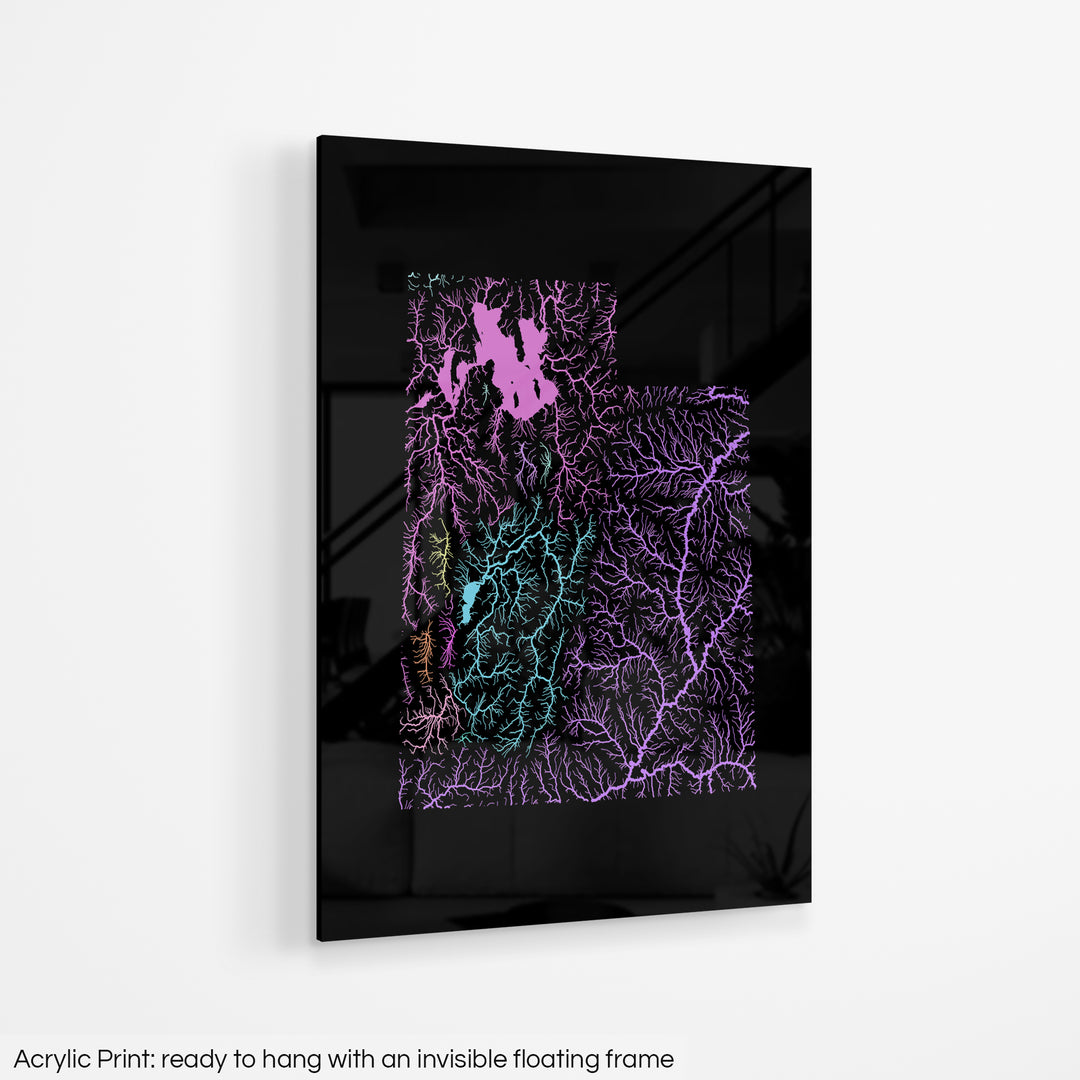 A colourful Grasshopper Geography map hanging on a white wall. The text at the bottom reads: Acrylic print - ready to hang with an invisible floating frame.
