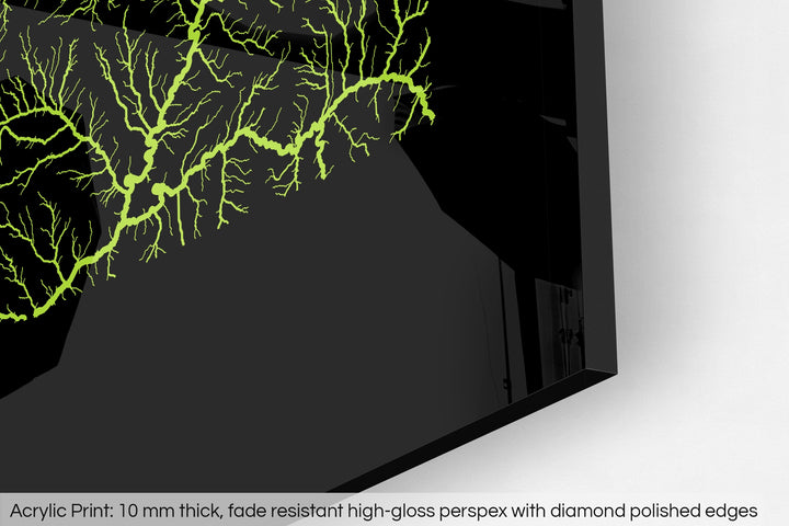 Closeup of an acrylic panel's corner, the details of a Grasshopper Geography map is visible. The text at the bottom reads: Acrylic print - 10 mm thick, fade reistant high-gloss perspex with diamond polished edges.