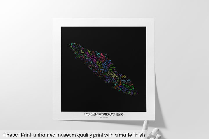 Unframed fine art print of a colourful map with a thick white mat. The title of the map and the Grasshopper Geography logo is printed on the mat, below the image. The map print lies flat on a white surface, a hand holding up one of the corners. The bottom text reads: Fine art print - unframed museum quality print with a matte finish.