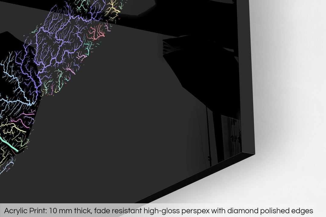 Closeup of an acrylic panel's corner, the details of a Grasshopper Geography map is visible. The text at the bottom reads: Acrylic print - 10 mm thick, fade reistant high-gloss perspex with diamond polished edges.