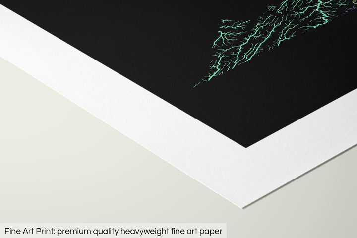 Closeup of a fine art print's corner lying on a flat surface, the details of a Grasshopper Geography map is visible. The text at the bottom reads: Fine art print - premium quality heavyweight fine art paper.