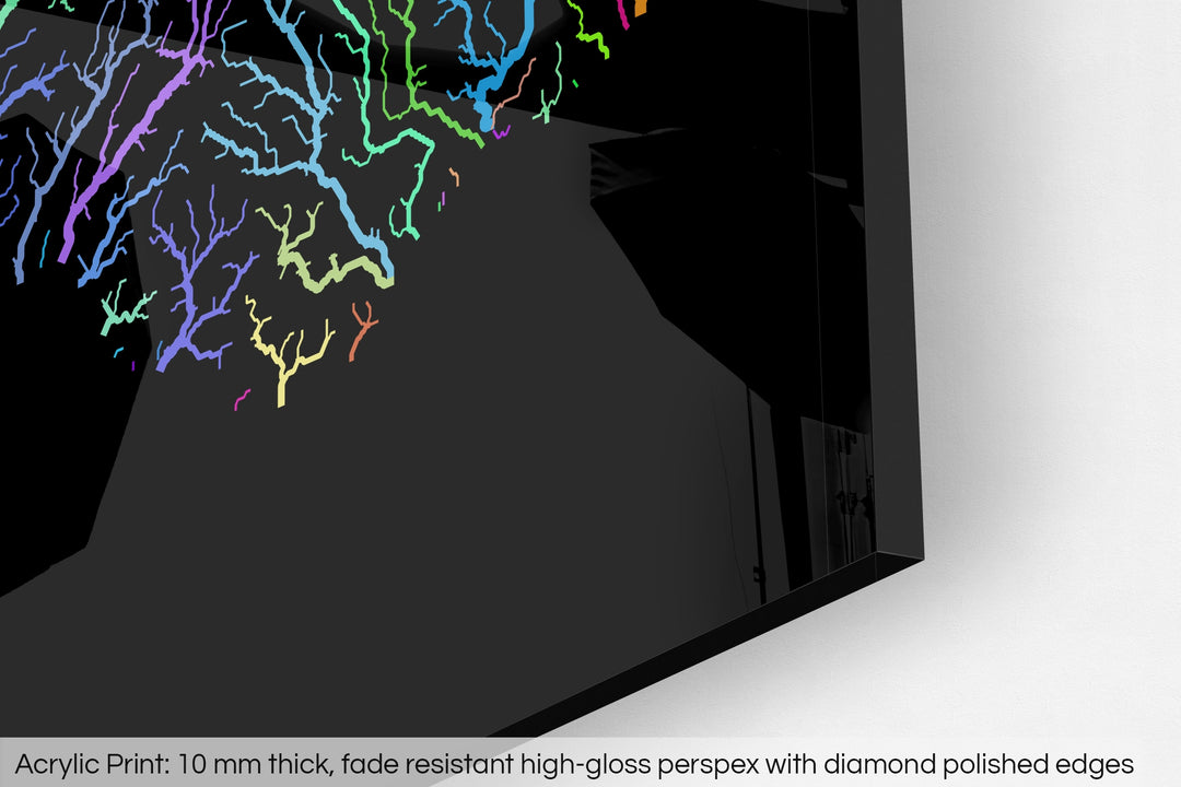 Closeup of an acrylic panel's corner, the details of a Grasshopper Geography map is visible. The text at the bottom reads: Acrylic print - 10 mm thick, fade reistant high-gloss perspex with diamond polished edges.