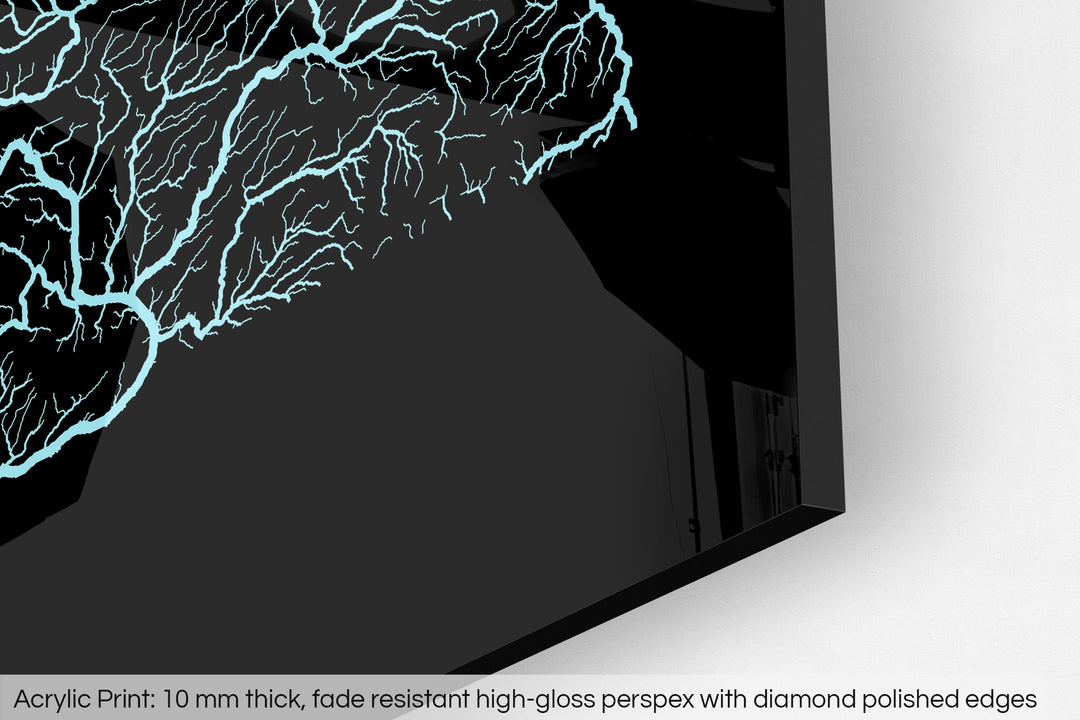 Closeup of an acrylic panel's corner, the details of a Grasshopper Geography map is visible. The text at the bottom reads: Acrylic print - 10 mm thick, fade reistant high-gloss perspex with diamond polished edges.