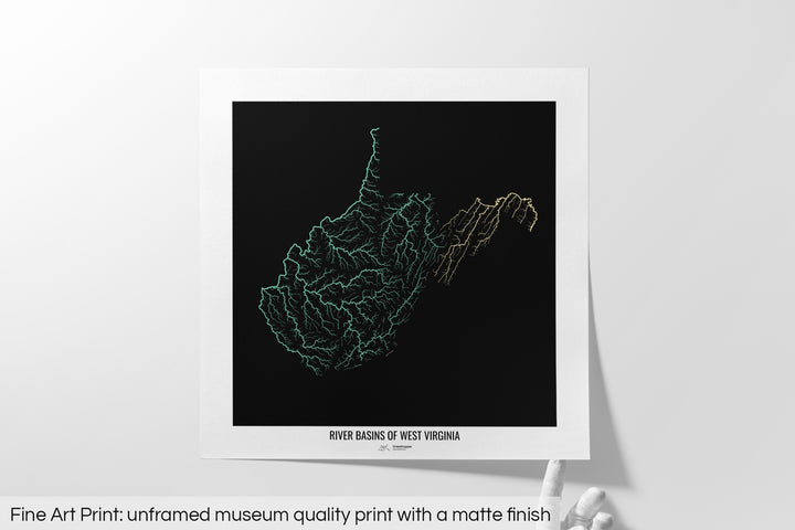 Unframed fine art print of a colourful map with a thick white mat. The title of the map and the Grasshopper Geography logo is printed on the mat, below the image. The map print lies flat on a white surface, a hand holding up one of the corners. The bottom text reads: Fine art print - unframed museum quality print with a matte finish.