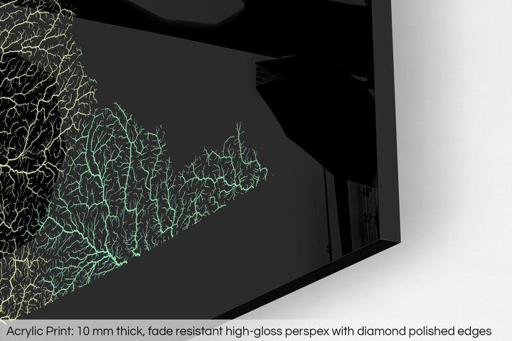 Closeup of an acrylic panel's corner, the details of a Grasshopper Geography map is visible. The text at the bottom reads: Acrylic print - 10 mm thick, fade reistant high-gloss perspex with diamond polished edges.