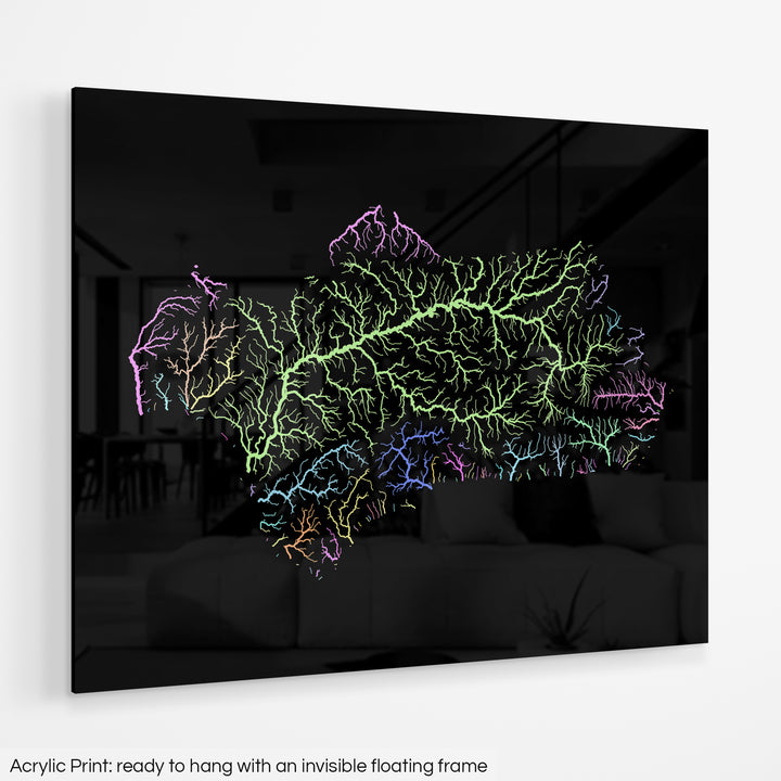 A colourful Grasshopper Geography map hanging on a white wall. The text at the bottom reads: Acrylic print - ready to hang with an invisible floating frame.