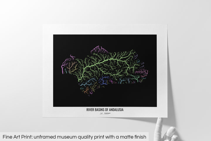 Unframed fine art print of a colourful map with a thick white mat. The title of the map and the Grasshopper Geography logo is printed on the mat, below the image. The map print lies flat on a white surface, a hand holding up one of the corners. The bottom text reads: Fine art print - unframed museum quality print with a matte finish.