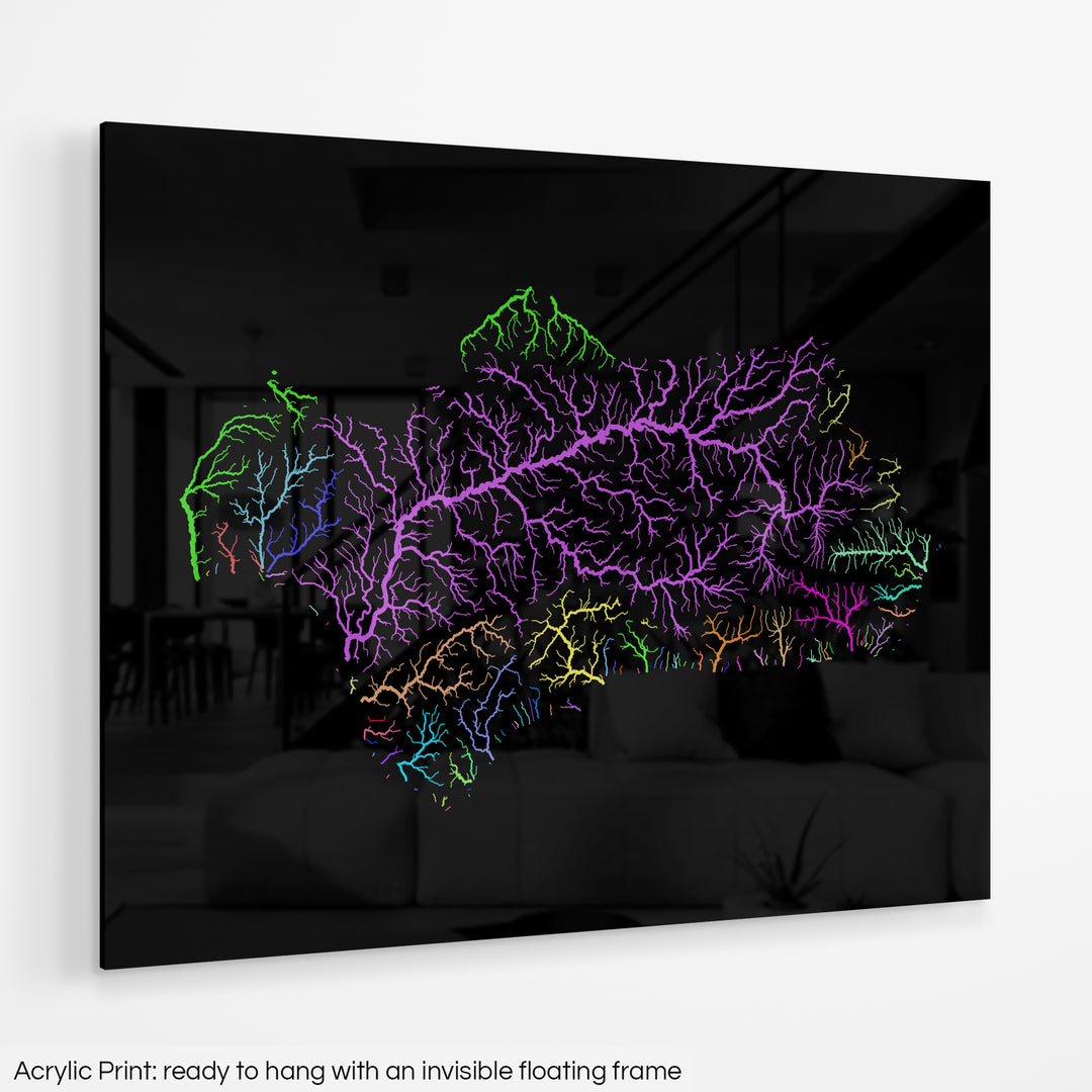 A colourful Grasshopper Geography map hanging on a white wall. The text at the bottom reads: Acrylic print - ready to hang with an invisible floating frame.
