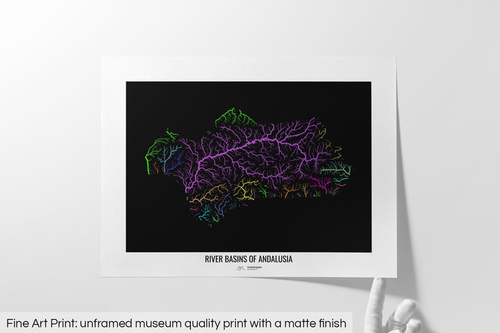 Unframed fine art print of a colourful map with a thick white mat. The title of the map and the Grasshopper Geography logo is printed on the mat, below the image. The map print lies flat on a white surface, a hand holding up one of the corners. The bottom text reads: Fine art print - unframed museum quality print with a matte finish.