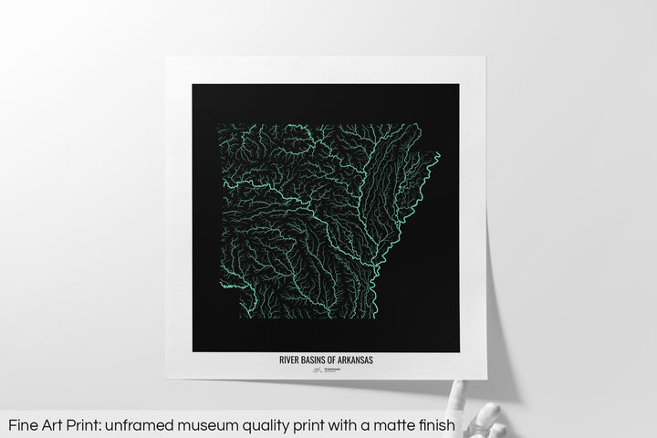 Unframed fine art print of a colourful map with a thick white mat. The title of the map and the Grasshopper Geography logo is printed on the mat, below the image. The map print lies flat on a white surface, a hand holding up one of the corners. The bottom text reads: Fine art print - unframed museum quality print with a matte finish.